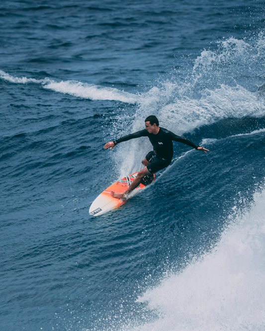 Surfer on wave during competition